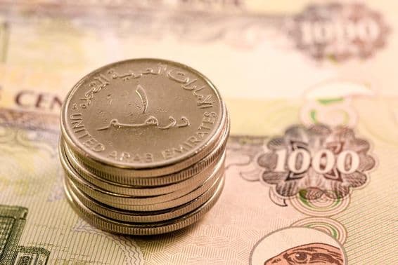 VAE-Währung: 1000 Dirham-Schein und 1 Dirham-Münze.