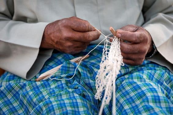 Vorbereitung eines Fischernetzes.