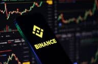 Binance-Logo auf einem iPhone-Bildschirm.