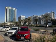 Gebäude im Dubailand Residence Complex, einem neuen Wohngebiet.